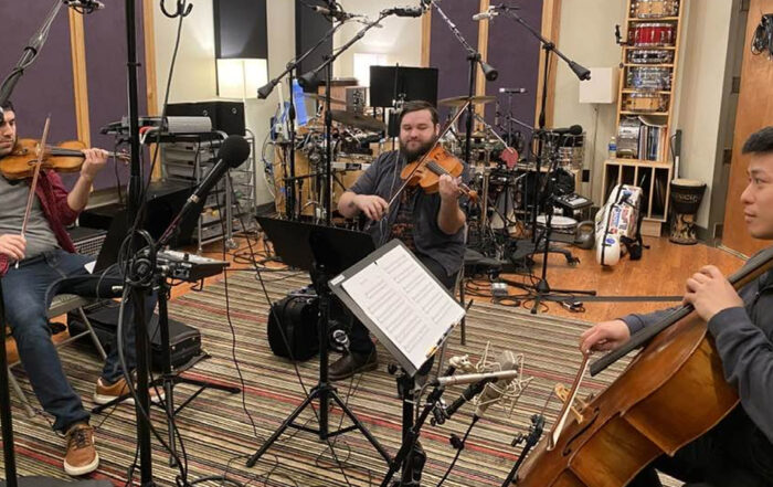 From left to right: Chuck Callahan (violin); Patrick Monnius (viola); Caleb Yang (cello)